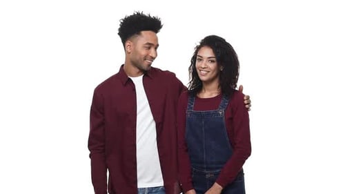Young Couple Posing Together in Studio