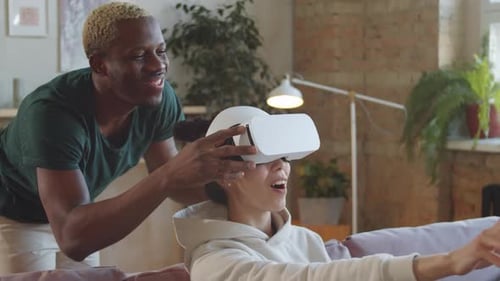 Woman Enjoys Virtual Reality Game with Friend