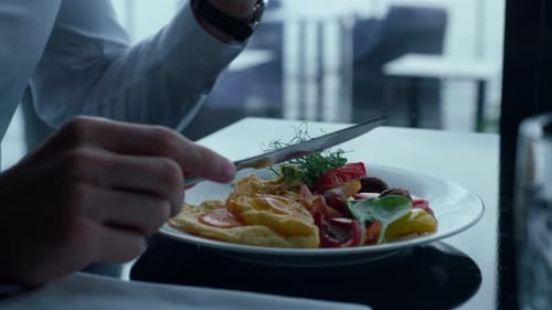 Successful Businessman Enjoying Fresh Healthy Meal in Luxury Hotel Cafe
