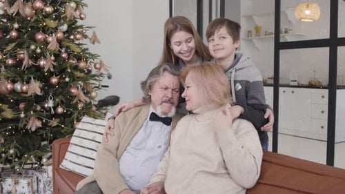 Happy Family Posing at Christmas Time