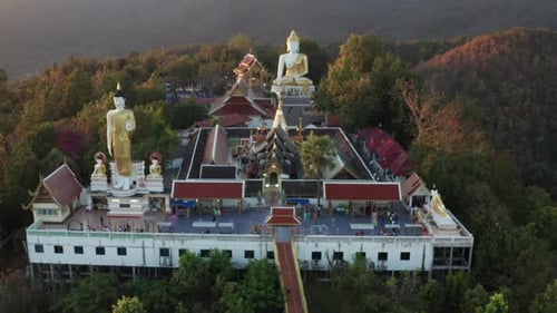 Aerial View of Wat Phrathat Doi Kham Buddha Pagoda and Golden Chedi in Chiang Mai Thailand