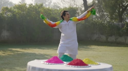 Young Man Celebrates Holi Festival Outdoors