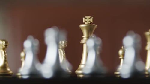 dolly shot of close up chess board game business strategy ideas concept with blur bokeh background