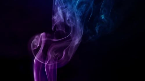 Purple and Blue Smoke Swirling on Black