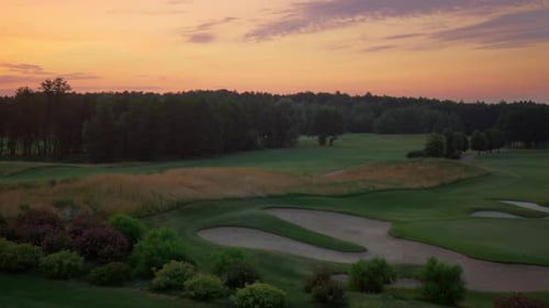Golf Course Aerial View in Evening Pink Sunset