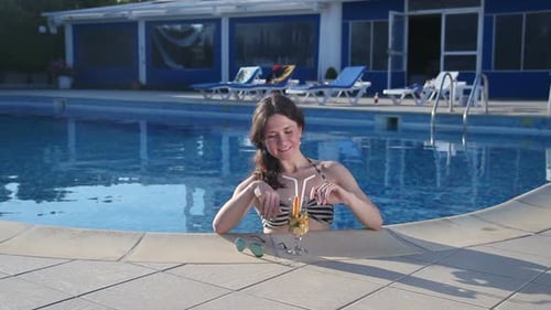 Beautiful Female Relaxing in Water, Enjoying Summer Sunlight