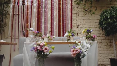 Elegant Wedding Table with Floral Arrangements