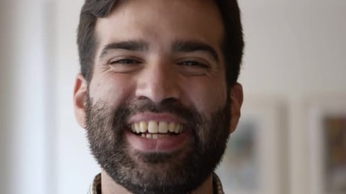 Closeup View of Happy Joyful Bearded Guy Posing Indoors