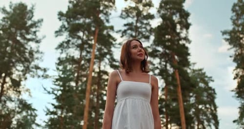 Portrait of a Beautiful Girl Walking in a Pine Forest. Rest in the Forest, Beautiful Nature. , 10Bit