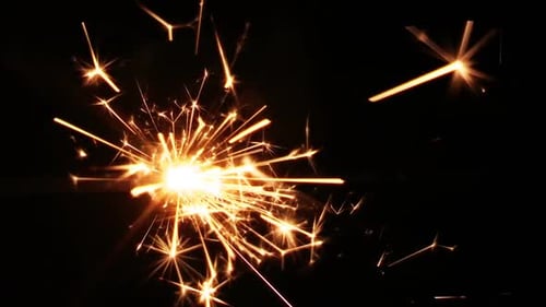 Sparkler Emitting Light in a Dark Setting