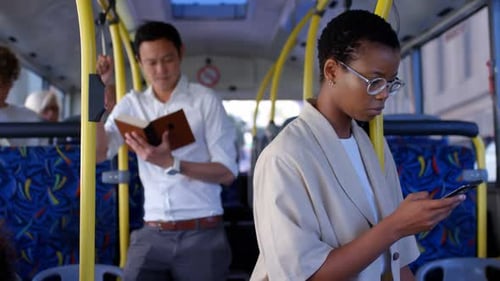 People Riding on Public Transportation Bus
