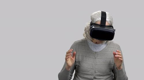 Senior Woman Using Virtual Reality Headset