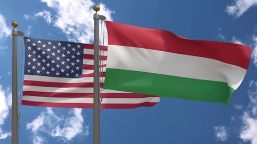 Realistic Flags of United States and Hungary Waving in Wind