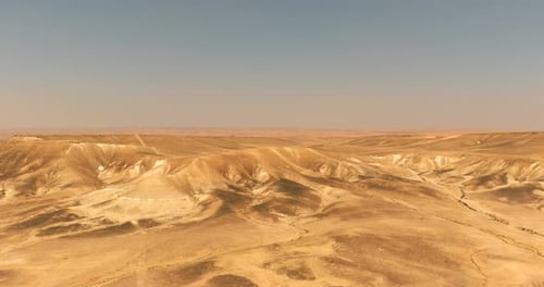 Dry Desert landscape, low pass aerial view.
