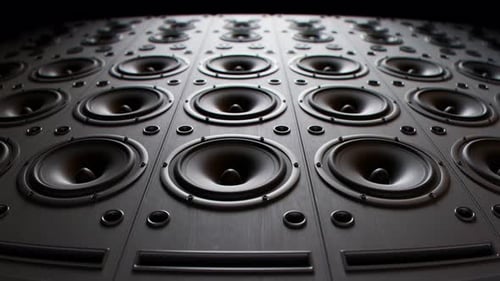 Modern speakers stacked in an endless wall loop. Membranes vibrate, studio mood.