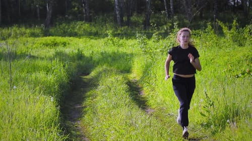 Female running in the forest