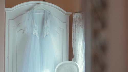 Wedding Dress Hanging Up