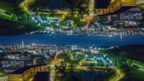 Night view of the city from the air time lapse