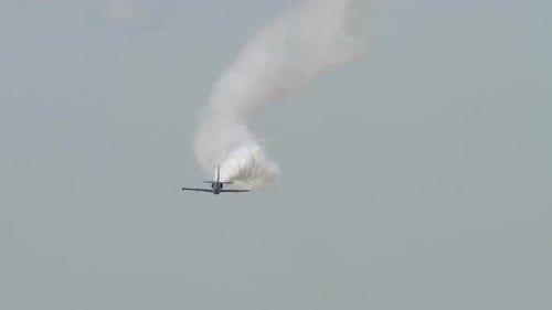 Jet Airplane Smoke Trail Performing Aerobatic Flight