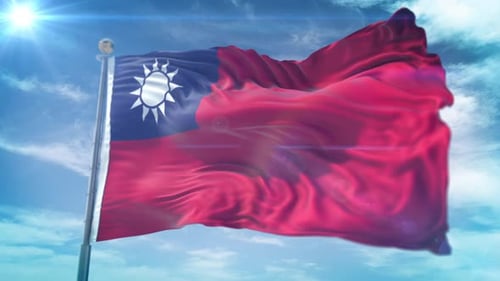 Waving Flag of Taiwan Republic of China Against Blue Sky