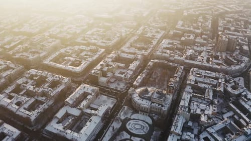 Cinematic Aerial Footage of Old City Center and Opera and Ballet Theatre During Sunny Winter Day