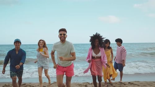 Group of friends having fun on the beach.