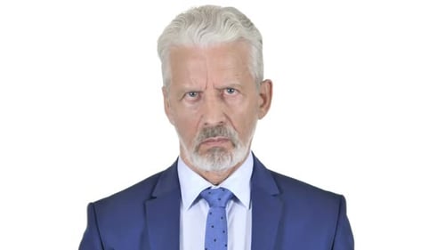 Stern Senior Man Stares at Camera
