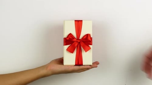 Gift Received with a Red Ribbon on White