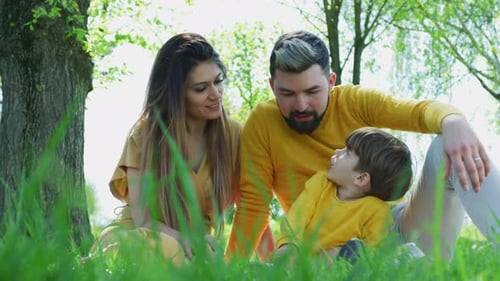 Happy Family Enjoying Time Together in Spring Park