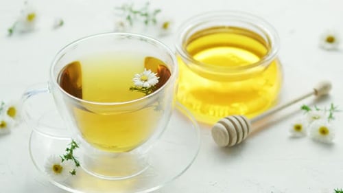 Herbal Tea and Jar of Honey