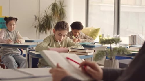 Multiethnic School Girls at Lesson