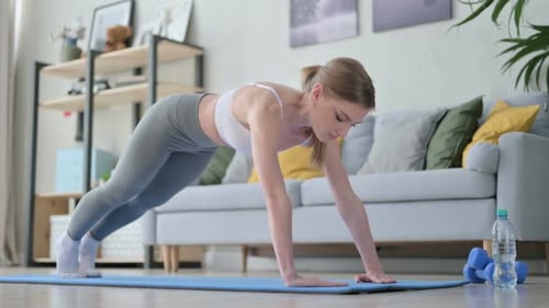 Woman Doing Mountain Climber Exercise at Home