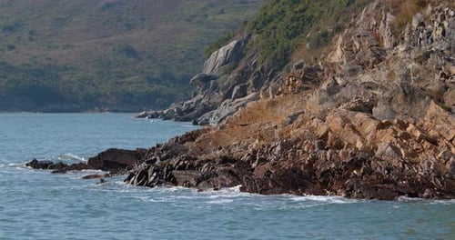 Ocean water and rocky cliffs