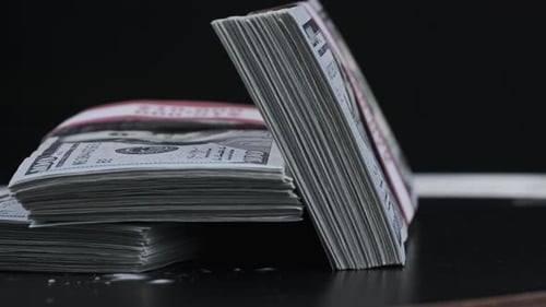 Bundles of One Hundred Dollar Bills Stacked