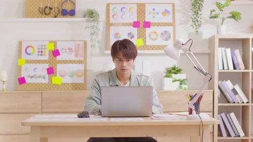 Entrepreneur handsome business asian man wear blue shirt finish working online close computer laptop