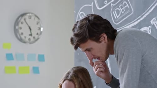 Team Brainstorming Ideas at Modern Workplace