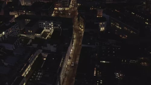 High Angle View of Illuminated Streets and Square Between Multistorey Apartment Buildings at Night