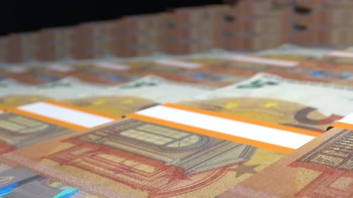 Many wads of money. 50 Euro banknotes. Stacks of money.