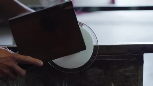 A Round Glass Vase is Handmade
