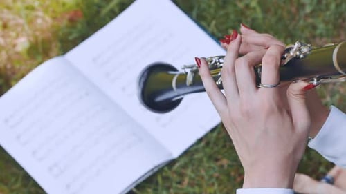 The Girl Plays the Clarinet By Notes