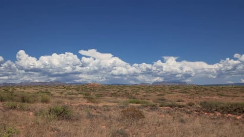 Desert Landscape with Clouds on a Sunny Day