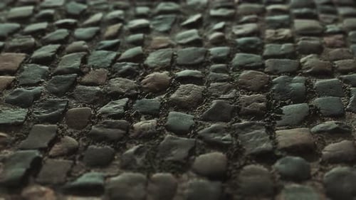 Moving Cobblestone Ground with Natural Stone Texture Background