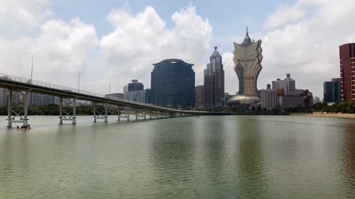 Paisagem urbana do Dia de Macau Nam Van Lake Timelapse Pan Up