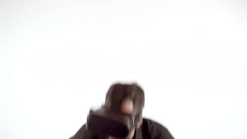 Man Laughing, Playing with VR Headset and Controller