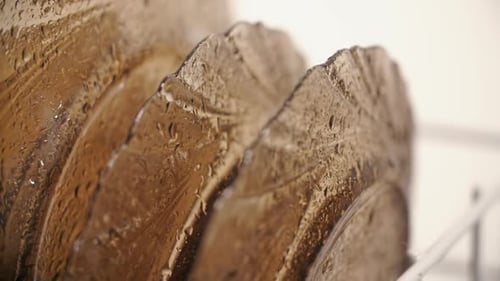 Close-Up of Glass Plates Washing With Water Spray