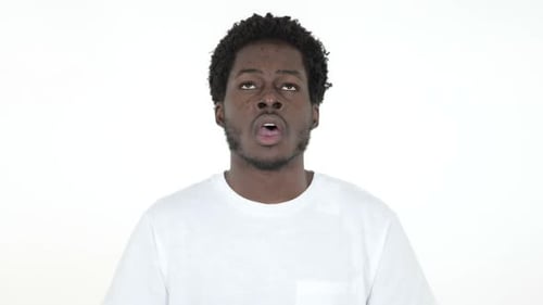 Man Screaming and Yawning in White T-Shirt