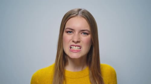Woman Demonstrates Range of Negative Facial Expressions