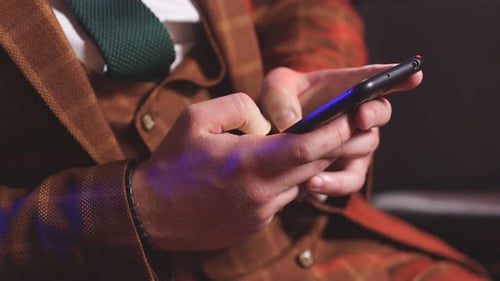 Close Up of Man Using Smart Phone