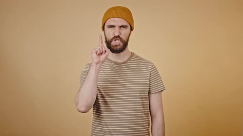 Brutal Lumberjack Shows Dissatisfaction in Studio Closeup