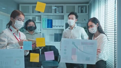 Group of Business people wear mask due to Covid19 meeting in office.